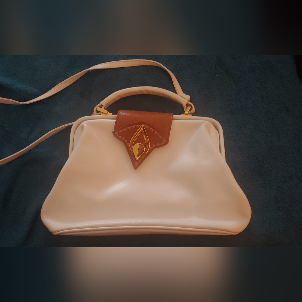 Vintage white and tan bag with black inside